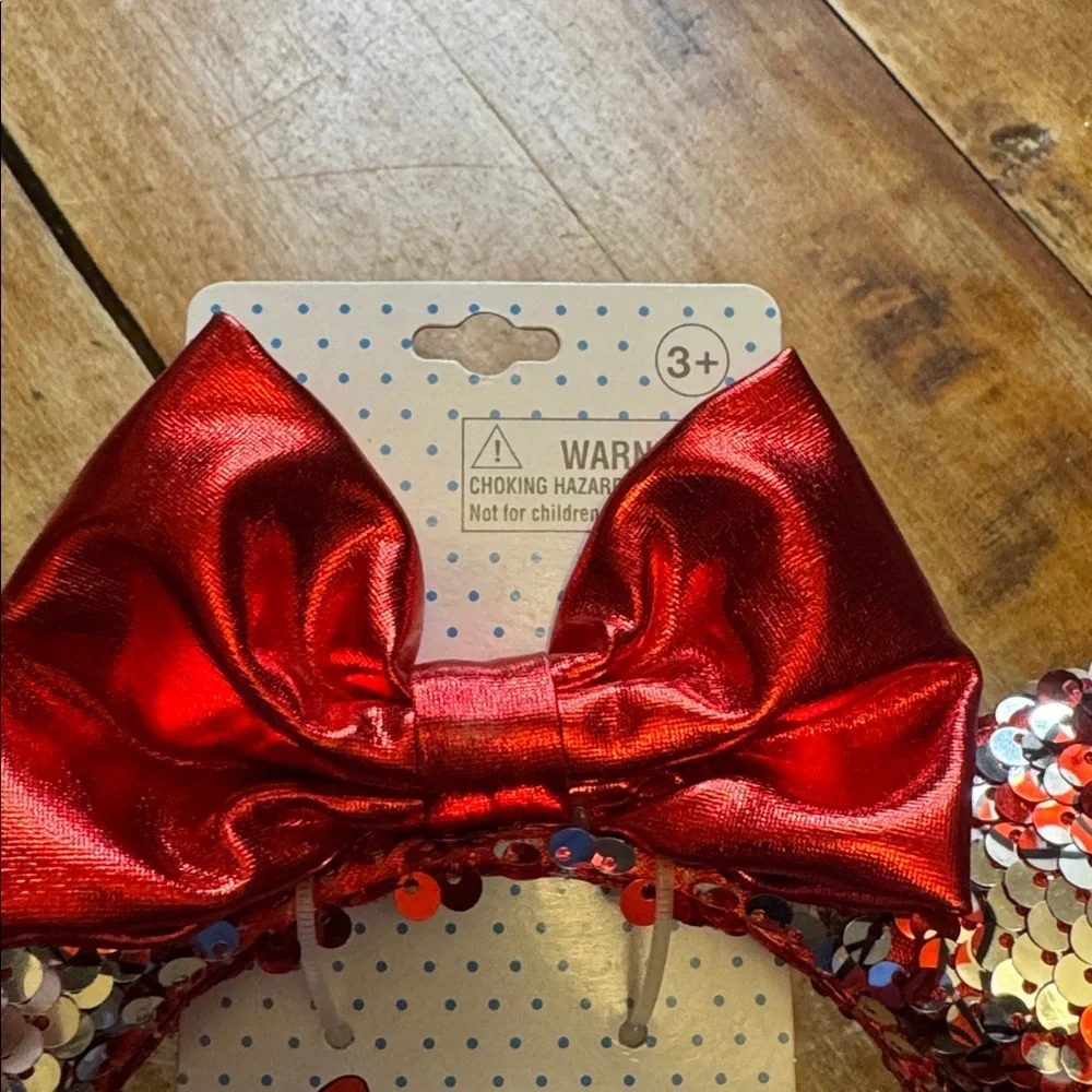 Disney Minnie Mouse Sparkling Red Sequin Ears with bow new in package never worn
